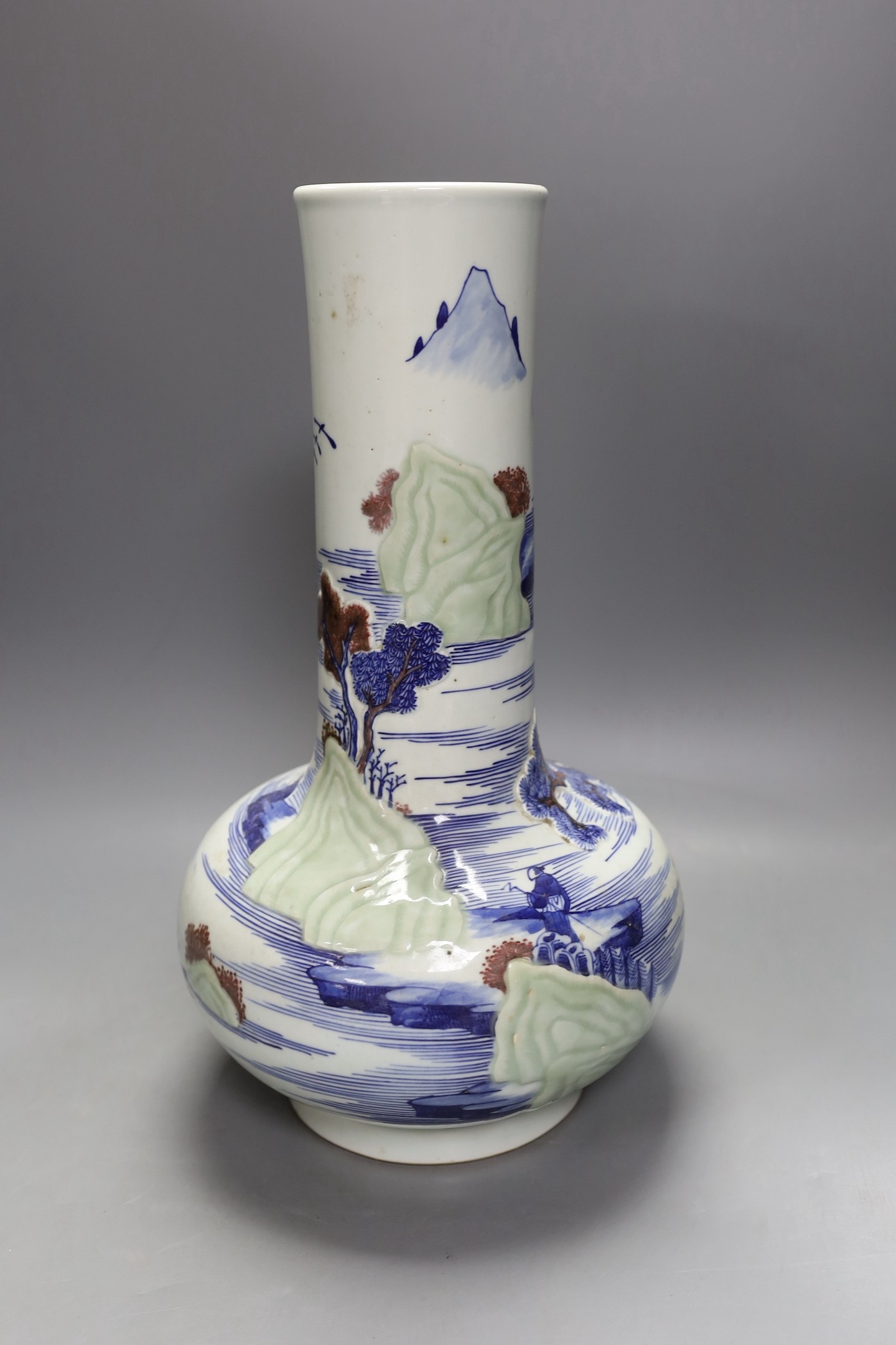 A large Chinese underglaze blue and copper red bottle vase, 42 cms high.